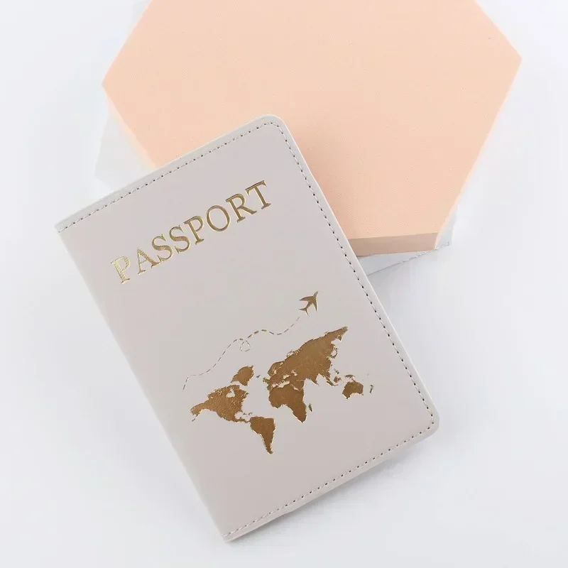 Porte-passeport en cuir PU unisexe, mince, mince, voyage, porte-monnaie, cadeau, étui à cartes, couverture du monde, mode simple, nouveau