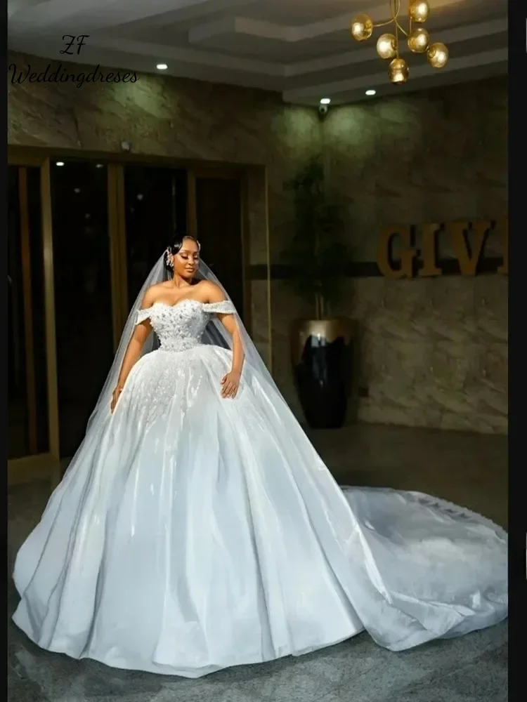 

Customized Luxury Shiny Tulle Sweetheart Ball Gown Wedding Dress Shoulder Sleeves Beading Pearls Applique Bridal Gown