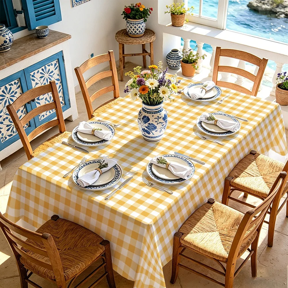 Fresh yellow and white checkered tablecloth, a French country-style tablecloth, with a simple checkered design.