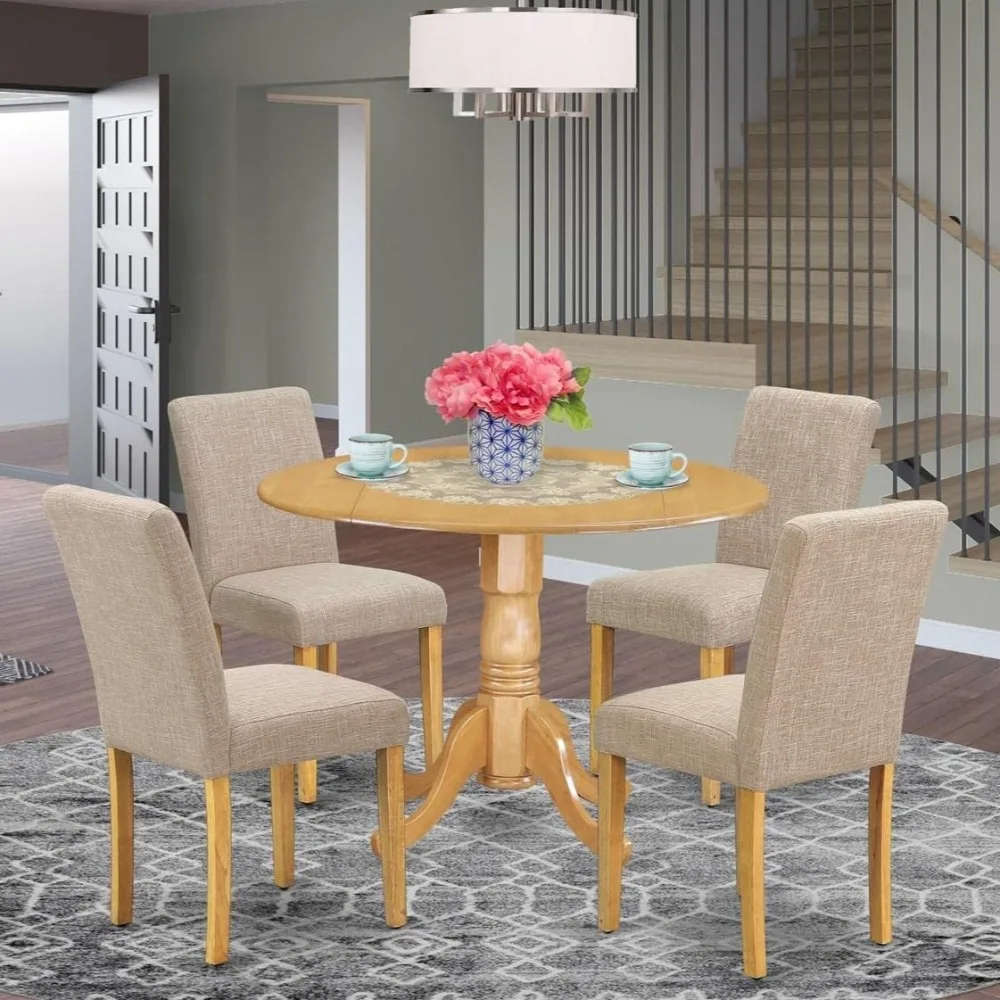 5 Piece Dining Table and Chair Set Includes a round dining table with hanging leaves and 4 light brown linen dining chairs