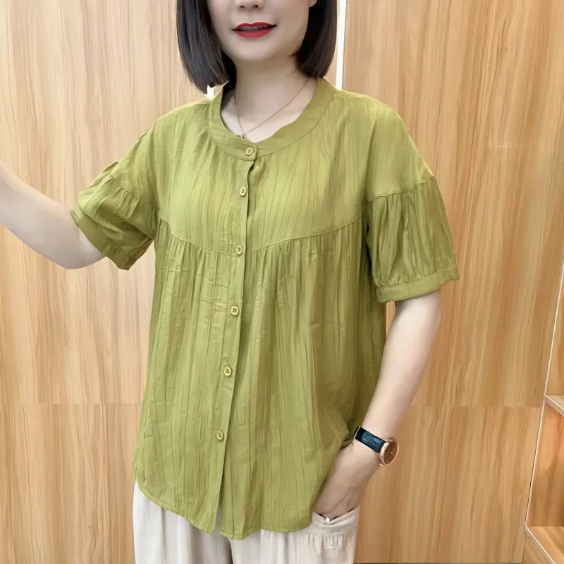 

2023 New Fashion Trend Simple Round Neck Patchwork Pleated Button Short Sleeved Cardigan Casual Loose Fitting Women's Shirt