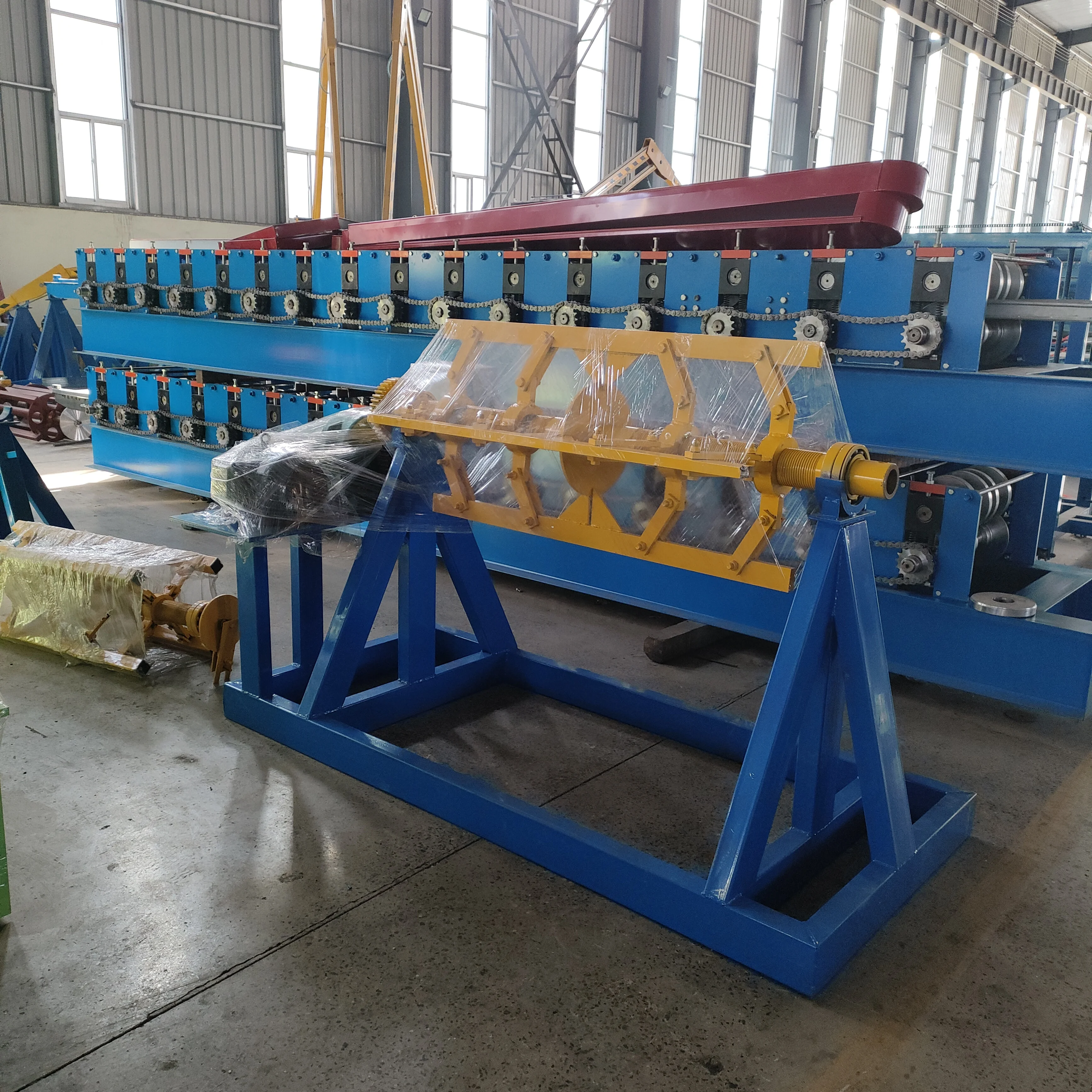 Machine de formage de rouleaux de feuilles de toit à ondes rondes