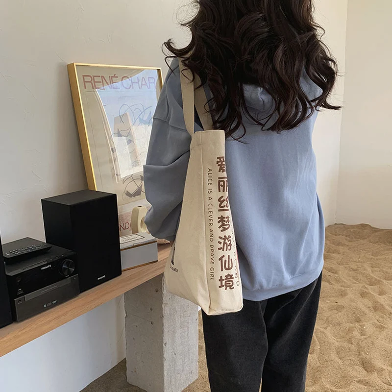 تصميم جديد المرأة حقيبة كتف قماش أليس في بلاد العجائب أكياس التسوق الطلاب حقيبة كتب القطن القماش حقائب اليد حمل للفتيات
