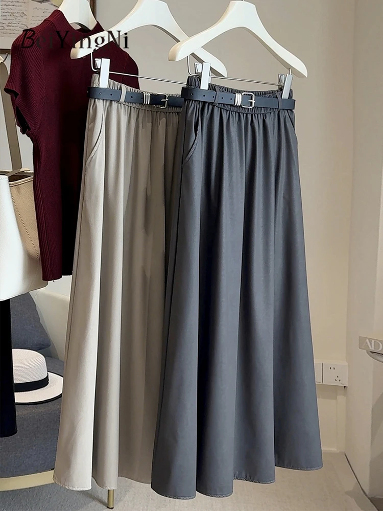 

Beiyingni, черные высококачественные юбки трапециевидной формы из искусственной кожи для женщин, однотонные офисные женские юбки-миди в японском стиле, длинная юбка с поясом Saia