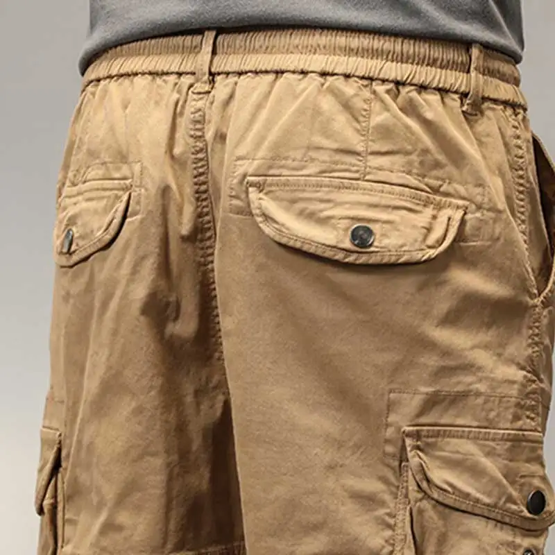 Nuovi pantaloni Cargo in puro cotone da uomo moda estiva solido allentato Largo taglia pantaloni Casual da uomo Multi tasche pantaloni Cargo Casual maschili