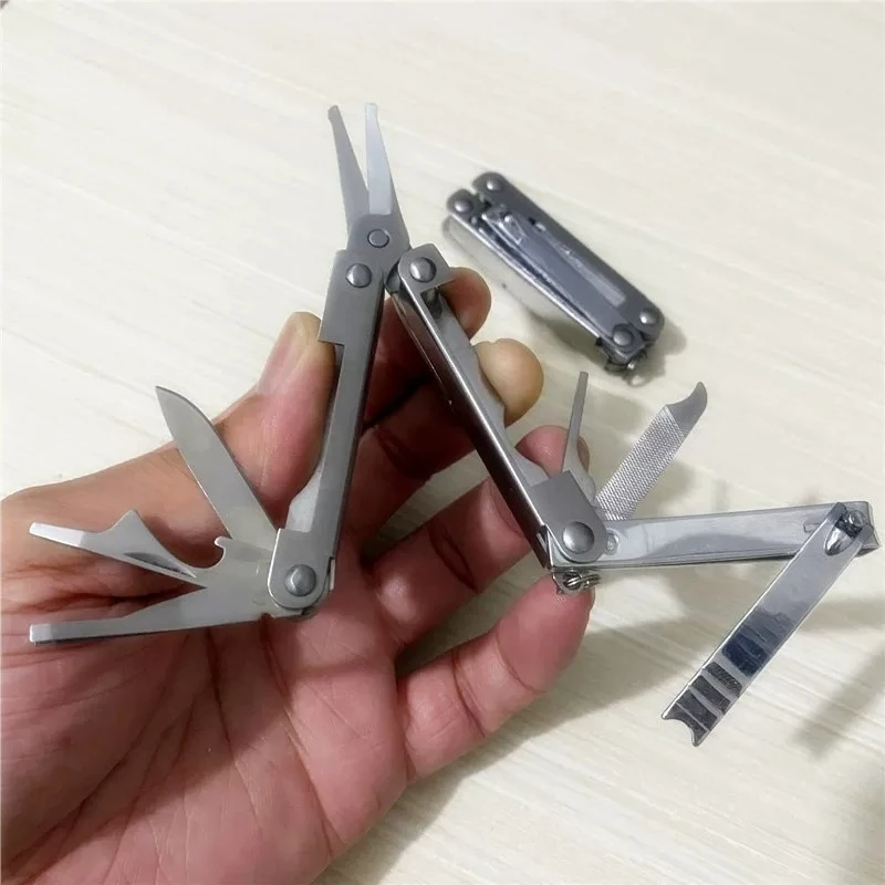 Multifunctional folding scissors wimchester combination tool nail scissors portable bottle opener knife
