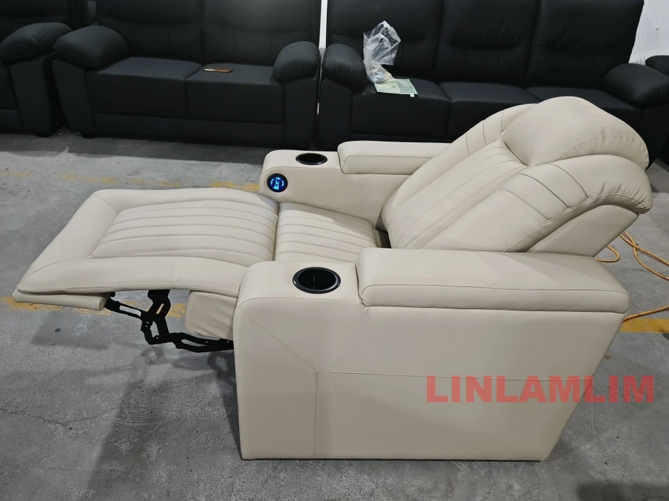 كرسي أريكة فاخر من الجلد الطبيعي للمسرح المنزلي، مقعد مستلق حديث يعمل بالطاقة الكهربائية مع مسند للقدمين وحاملات أكواب