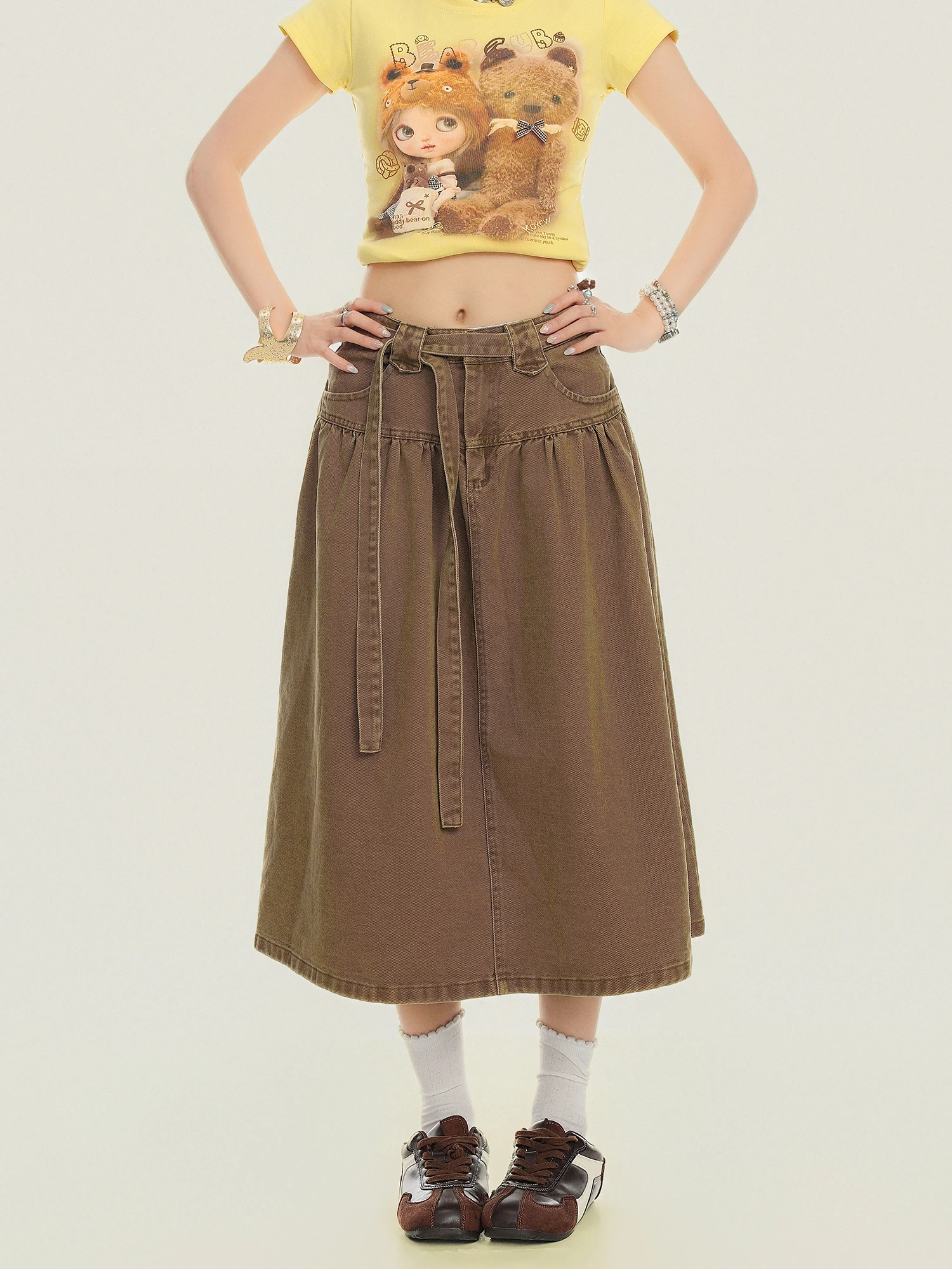 

Американская ретро-юбка в студенческом стиле, свободная джинсовая юбка А-силуэта, женская, средней длины, стройнящая, повседневная, с высокой талией, из полиэстера и хлопка