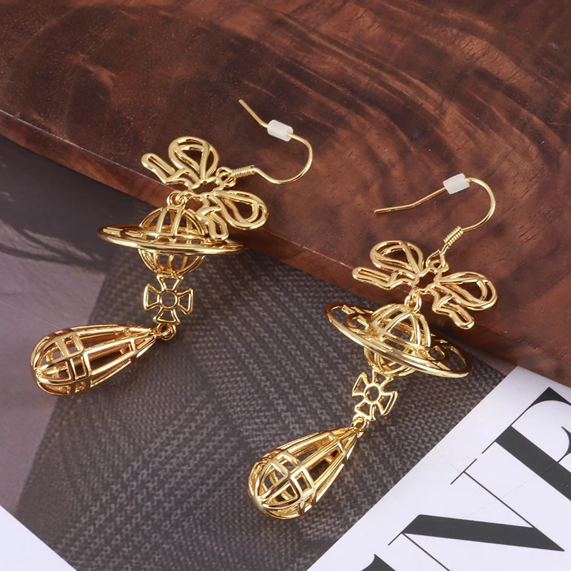 أقراط على شكل فيونكة مجوفة من HQ للسيدات من النحاس المطلي بالذهب بتصميم قطرات الماء أقراط عصرية مخصصة إكسسوارات فاخرة هدايا