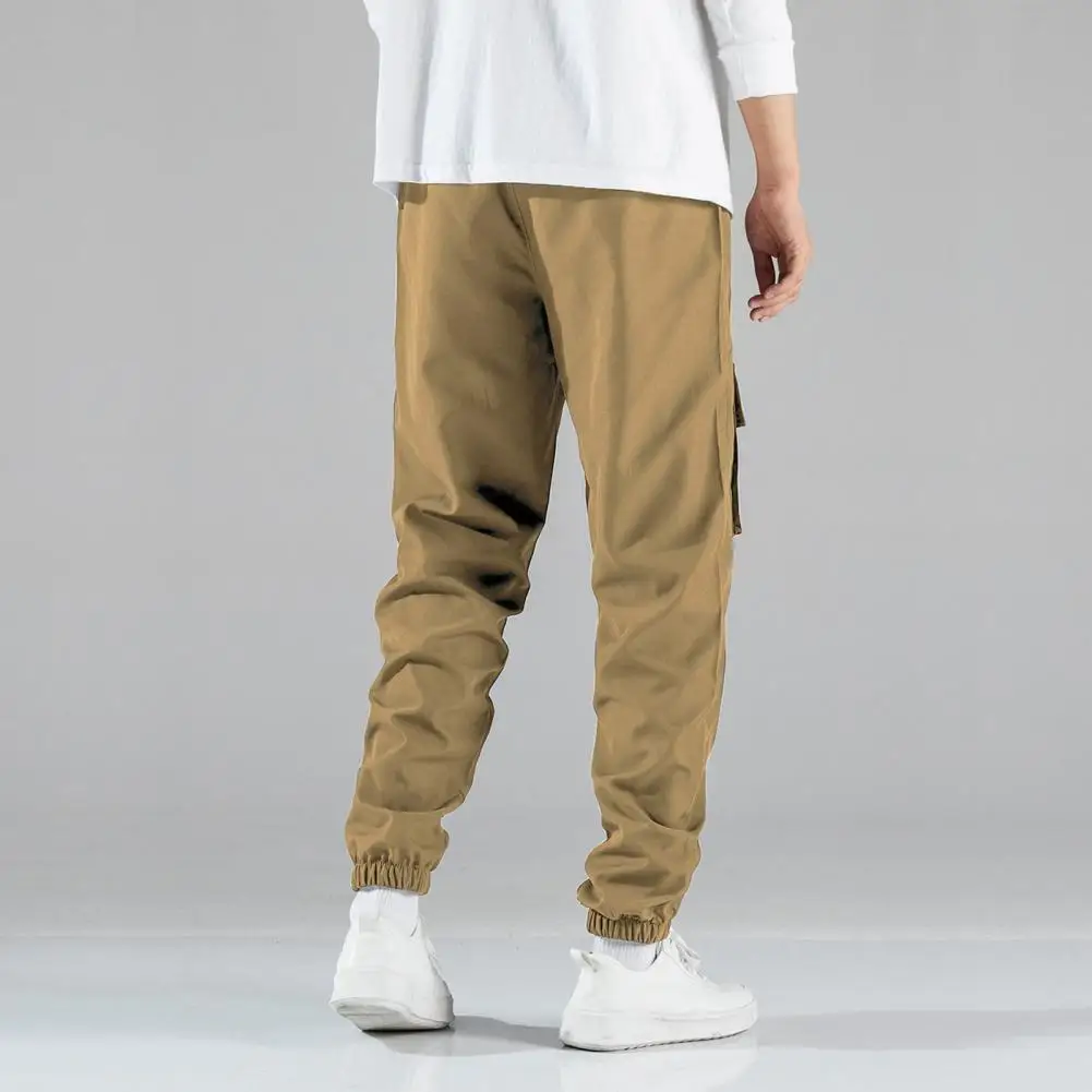 

Pure Color Trousers Men's Drawstring Cargo Pants with Elastic Waist Multiple Pockets Ankle-banded Sport Trousers for Daily Wear