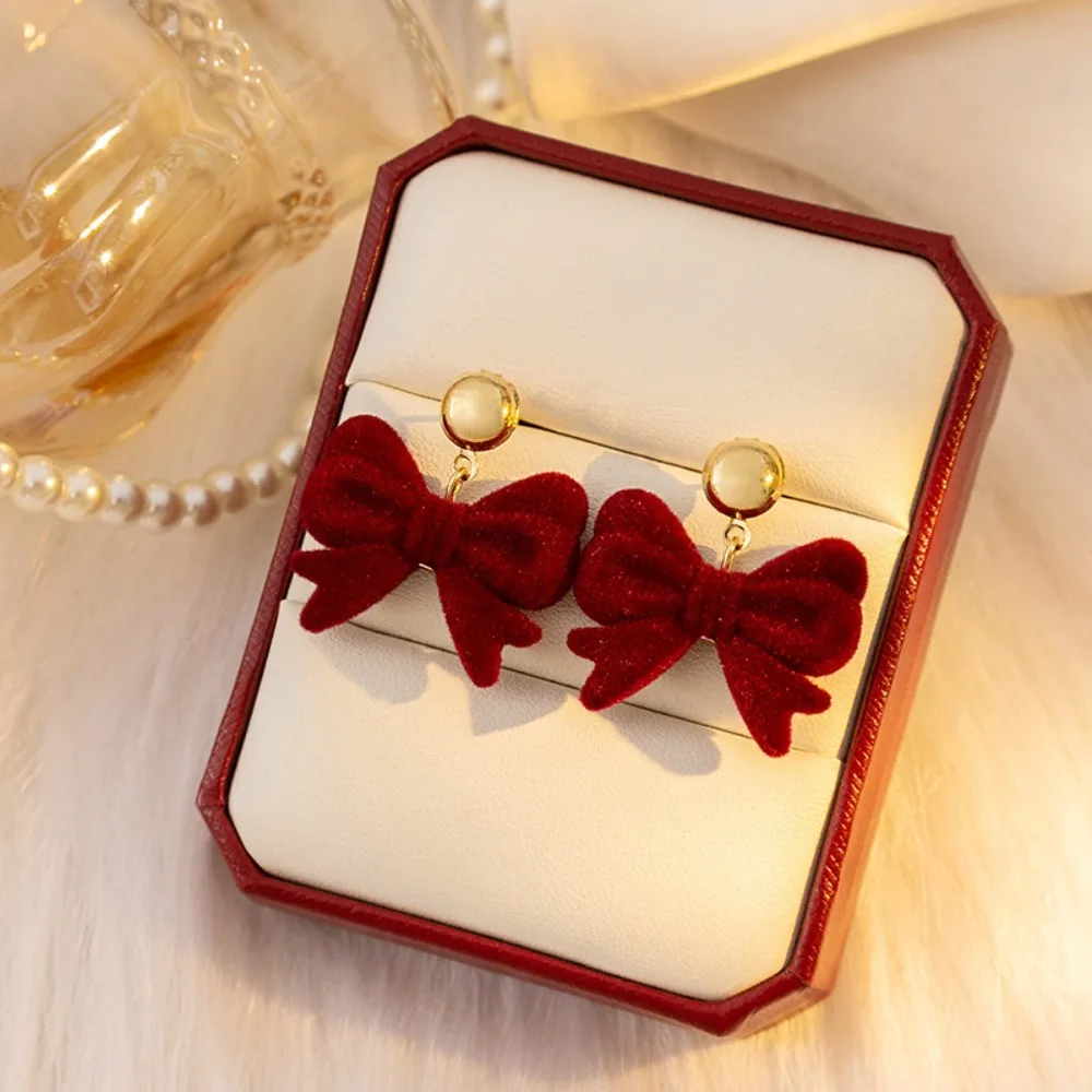 سبائك الزنك بورجوندي يتدفقون القوس أقراط مجوهرات حمراء القوس استرخى أقراط يتدفقون سلسلة شرابة طويلة هدية السنة الجديدة