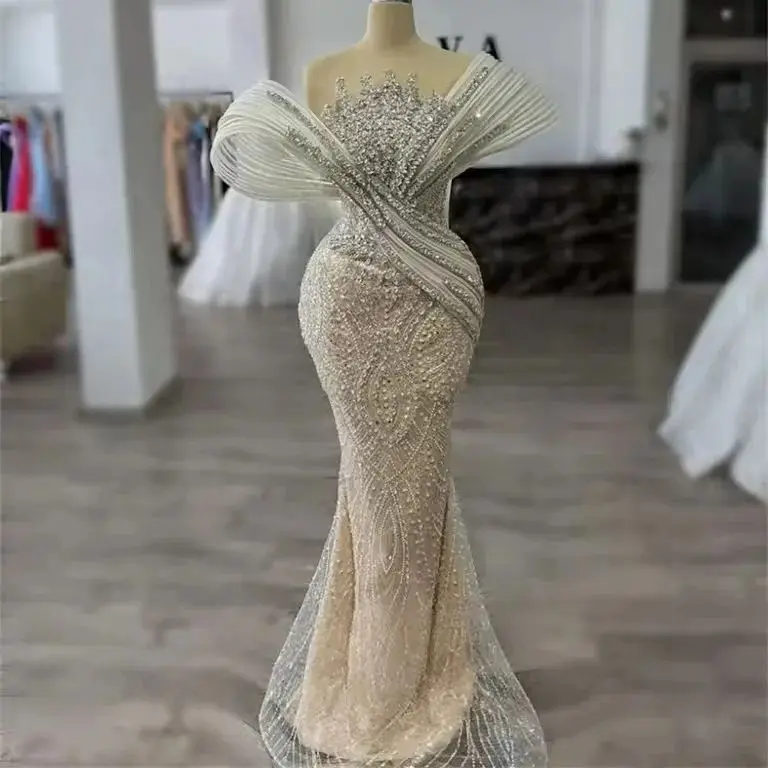 

Elegant Off The Shoulder Champagne Arabic Party Dress Mermaid Prom Dresses 2026 Customized Beaded Crystals Evening Gowns Robes