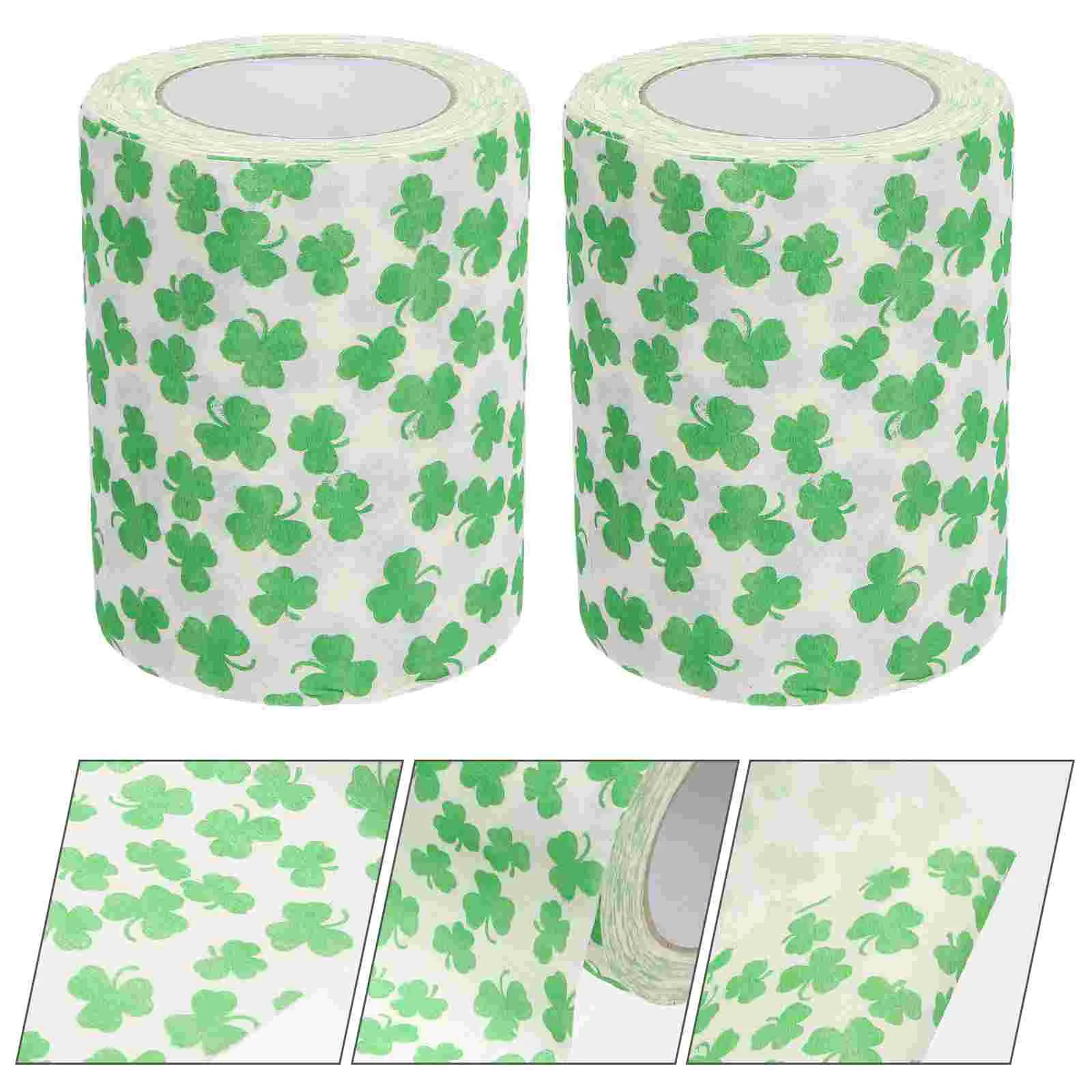 2 rolos de papel higiênico com decoração de vegetação, bandeja de papéis usada, guardanapos de rolagem, polpa de madeira, tecido de banheiro para