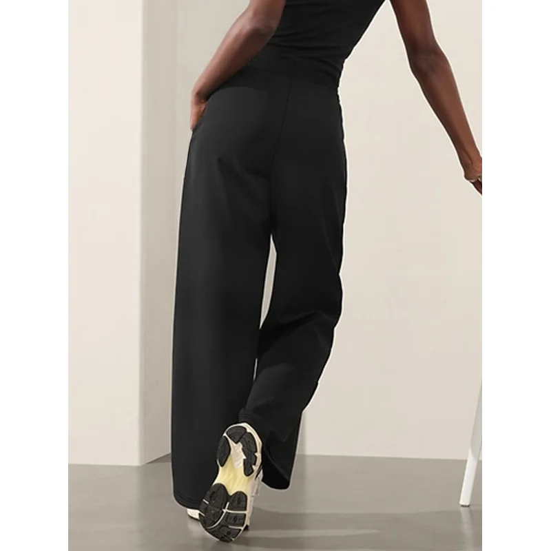 2025 Pantaloni minimalisti alla moda a gamba larga da donna Pantaloni da festa neri dimagranti a vita regolare