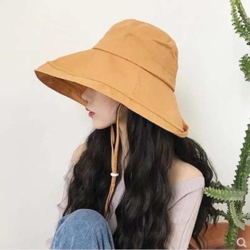 

Cotton and linen windproof rope solid-color wide-brimmed fisherman's hat women's casual versatile foldable basin