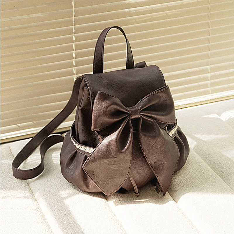 

Классический винтажный рюкзак, коричневый рюкзак из мягкой кожи с бантом на шнуровке, простой, легкий и художественный, повседневный женский рюкзак
