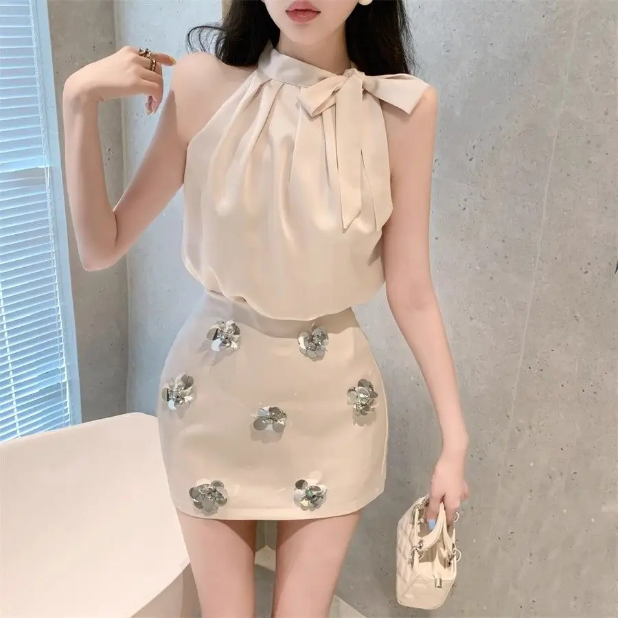 Franse stijl satijnen hemdje set dames luxe mouwloze blouse met bloemenrok elegante tweedelige outfit hoge taille minirok