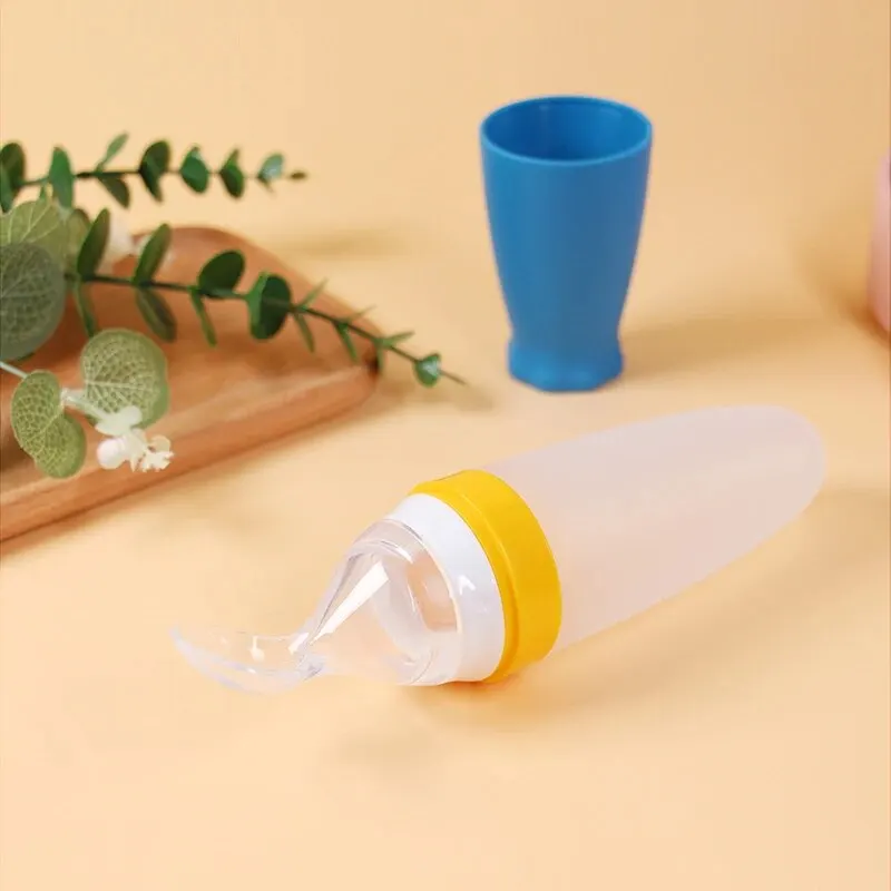 1 Pcs Baby Rice Cereal Bottle Dropper Feeding Squeeze Spoon Soft Silicone Spoon Cute Rocket Shape Soft Non Slip Feeding Bottle