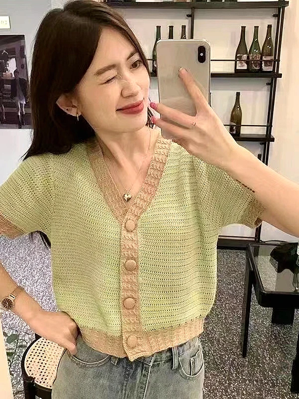 

Summer New Sle 2026 Women's Knitted ort Sve V-Ne Open Cardigan Color Blo Design Hollow out ort Length Top