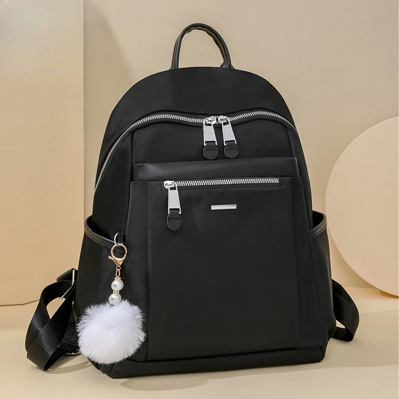 

Nylon lightweight student schoolbag, cute plush pendant, ladies' backpack, large-capacity travel waterproof backpack