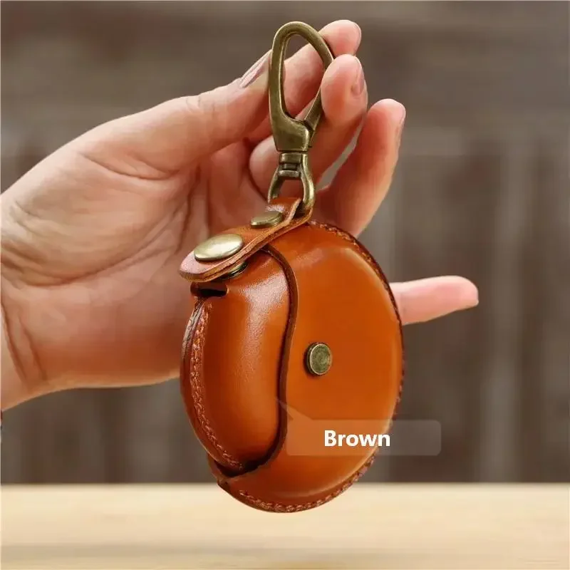 Handgefertigte Aufbewahrungstaschen, kleine runde Taschen aus echtem Leder, tragbare und kreative Bluetooth-Kopfhörerhüllen, hochwertige Geschenkboxen. – Detail 11