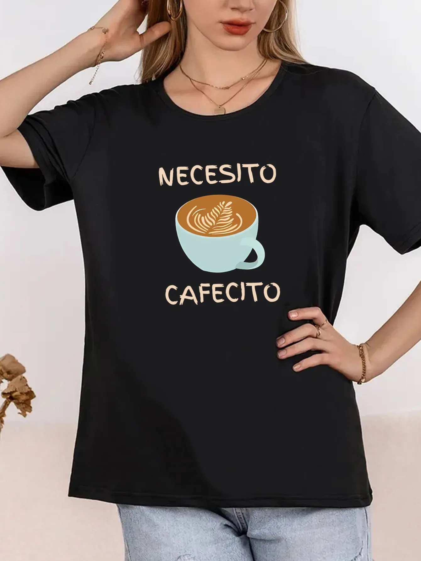 

Women's Crew Neck T-shirt with Coffee Cup and "NECESITO CAFFECITO" Graphic Print. Soft Mid-stretch Fabric for Casual Lounge Wear