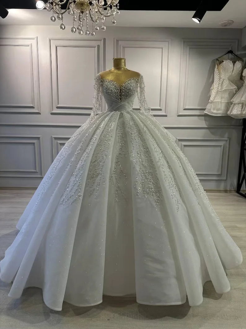 

Luxury Pearls Beaded Ball Gown Wedding Dresses Long Sleeve V Neck Sequined Princess Bridal Gown With Train For Bride Customized