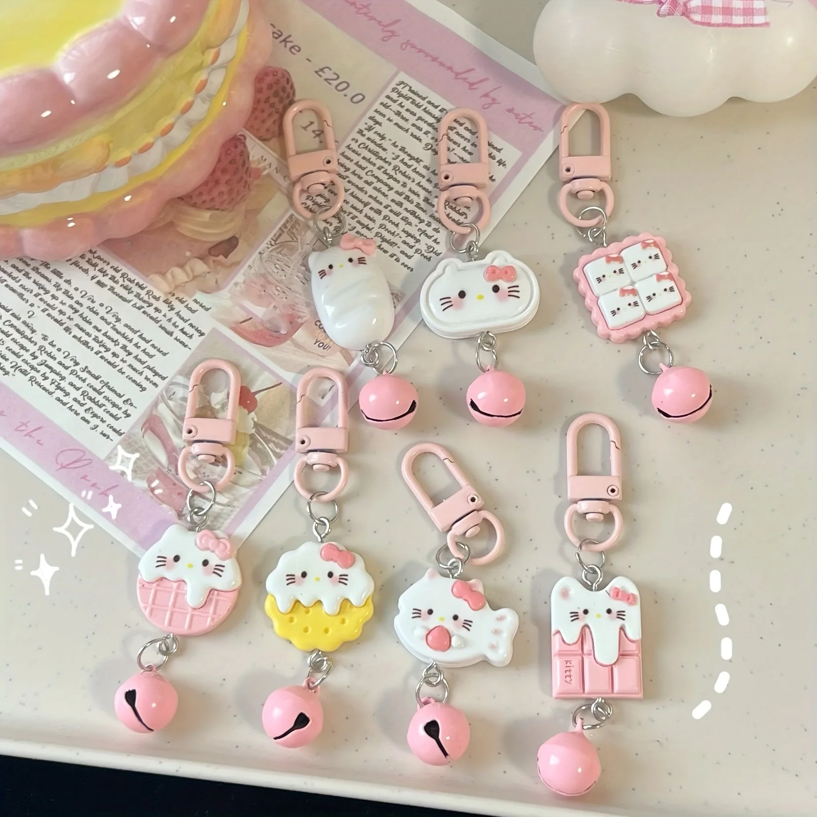 

7 pieces of Sanrio cute cartoon pink kitten bell pendant keychain ins all-match schoolbag small pendant | girlfriend couple gift