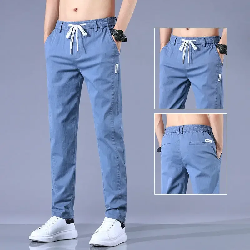 Pantaloni dritti solidi da uomo casual moda primavera autunno streetwear abiti maschili denim pantaloni sportivi larghi in vita elastica JJ593