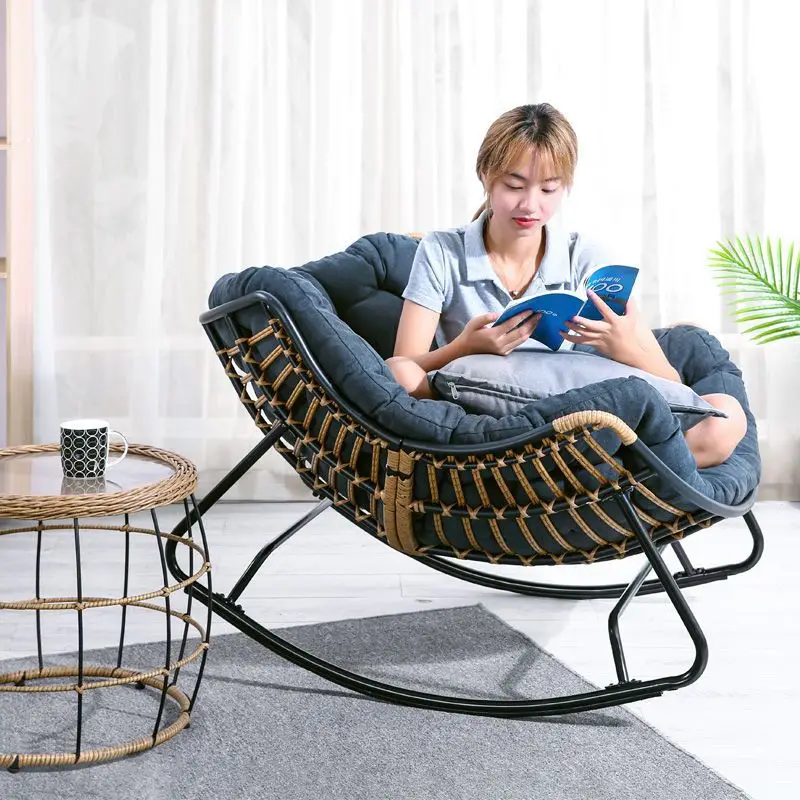 Rattan rocking chair in a modern living room setting