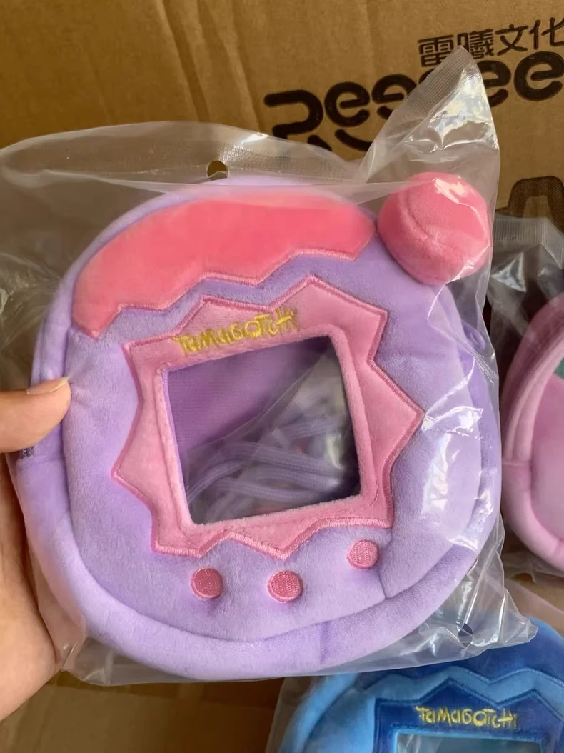 Auf Lager Bandai Tamagotchi Paradise Elektronische Haustiermaschine Plüsch Aufbewahrungstasche Memetchi Mimitchi Plüschtier Anhänger Kopfhörertasche