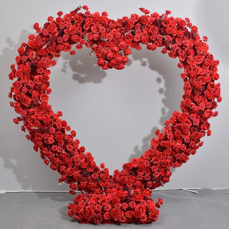 Red heart-shaped shelf floral arrangement wedding background stage flower proposal event celebration decoration simulated flower
