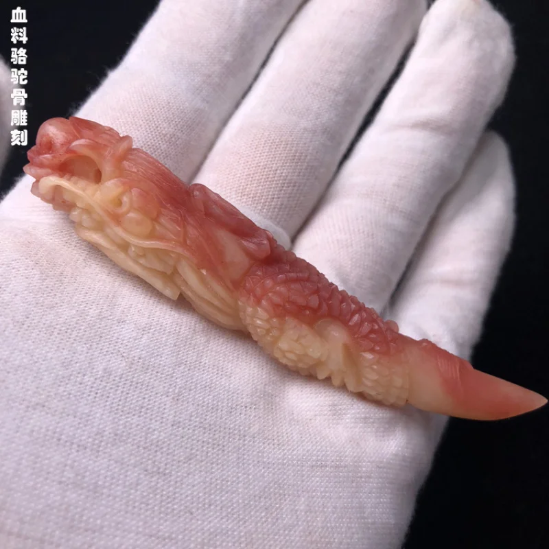 

Blood-colored bone carving of a spitting pearls , Vajra-moon Buddha bead pendant accessory