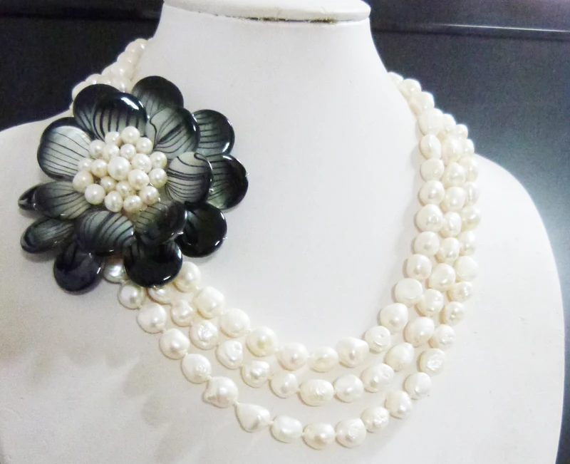 

One word - perfect !!! 3 layers of baroque freshwater pearls Shell flowers necklace