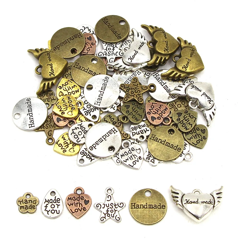 Mezcla de etiquetas de Metal corazón estrella flor etiqueta hecha a mano para ropa zapatos bolsas plata oro bronce etiqueta de costura accesorios de ropa 10/50 Uds