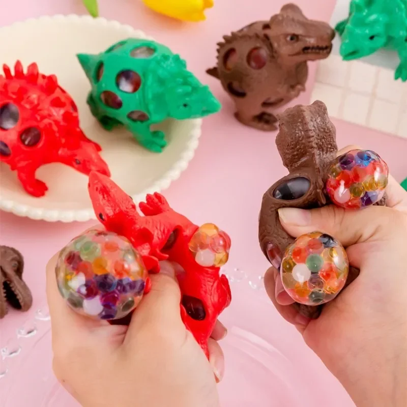 1pc Neue Dinosaurier Squeeze Spielzeug für Kinder Entlüftet Trauben Ball Prise Dekompression Antistress Squishy Spielzeug Relief Stress