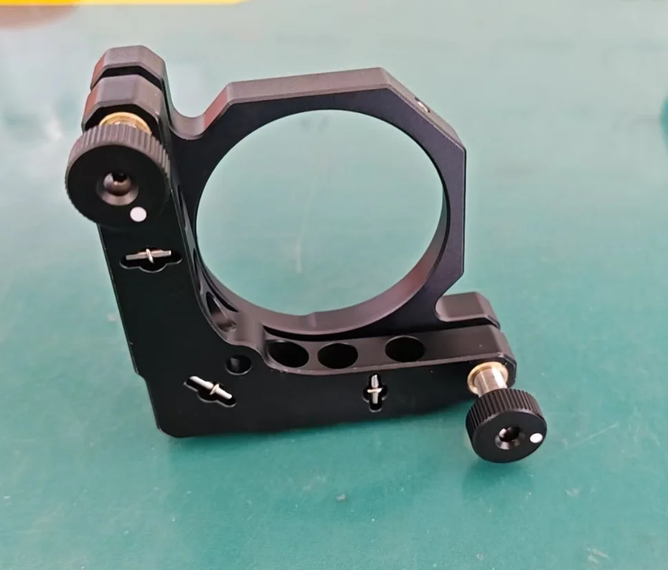 Optical adjustment bracket, capable of mounting 2-inch optical elements, with 2 differential adjusters.