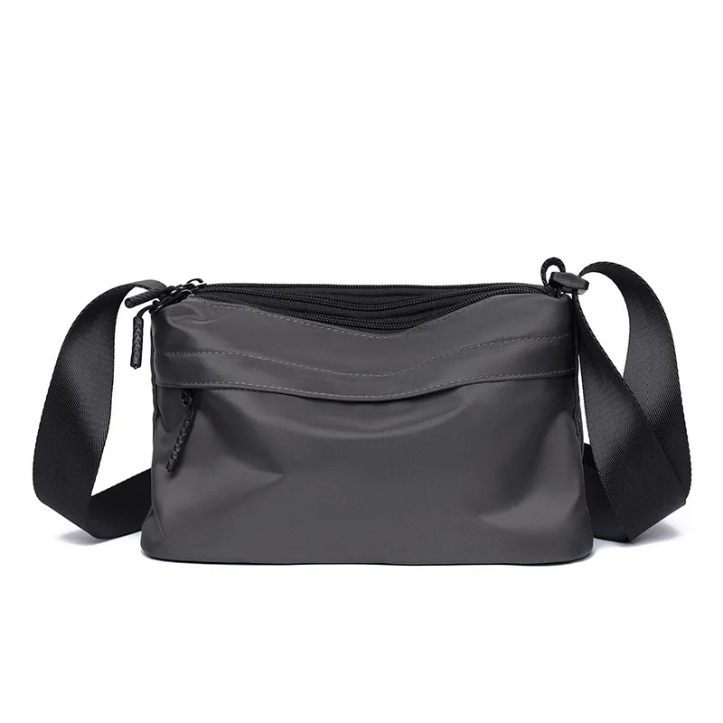 Nouveau sac à bandoulière simple pour hommes en tissu Oxford sac à bandoulière décontracté grande capacité à la mode pour les déplacements domicile-travail