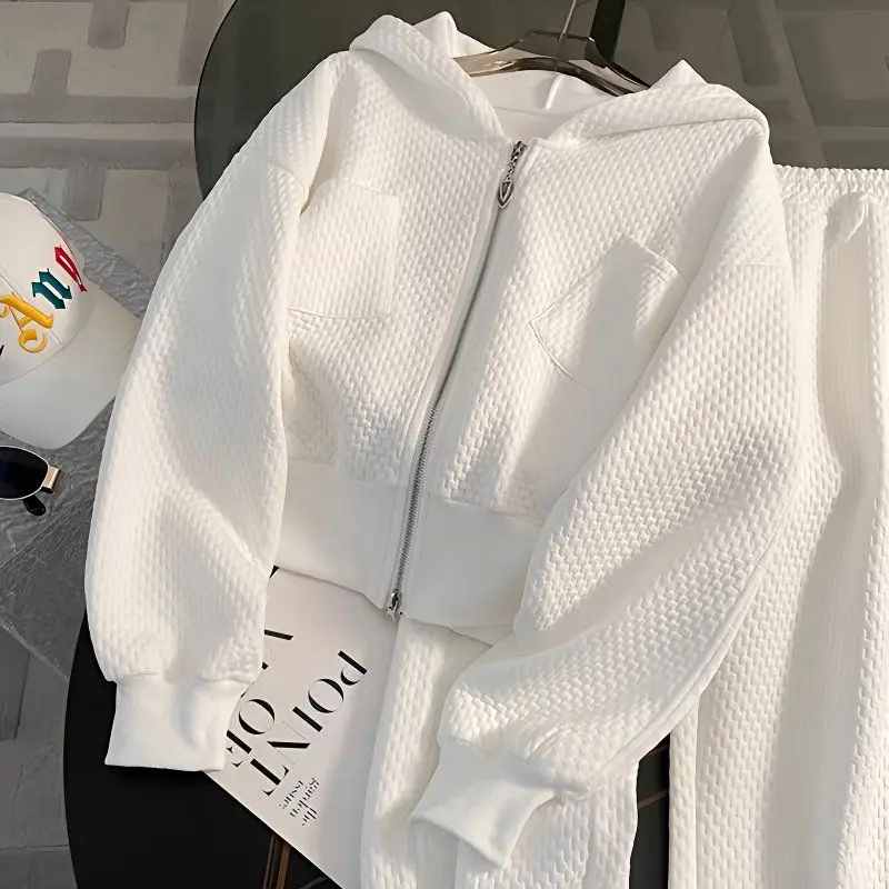 Design sense white casual sports suit new women's spring fashion loose foreign style age reduction thin trousers two-piece set