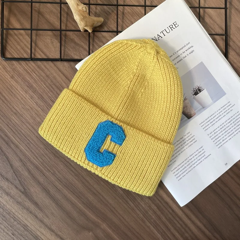 Korean version simple big C letter woolen hat for autumn and winter season, warm and ear protecting knitted hat for comfort