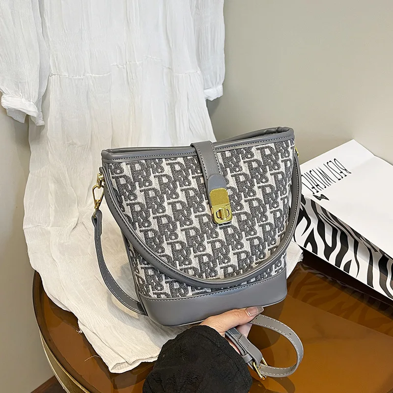 

Дизайнерская сумка-мешок для женщин, винтажный регулируемый ремень через плечо, кошелек с верхней ручкой, весна-лето, незаменимый