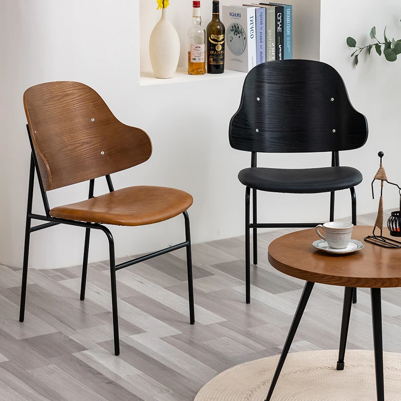 Simple Curved Backrest Dining Chair FurnitureComfortably Cushioned Restaurant Seating Versatile Design Offers in Dining Settings