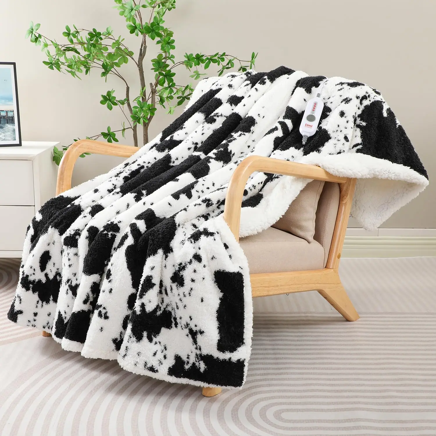 

Cow Print Heated Blanket - 4 Heat Settings, Auto Shut-Off, Machine Washable, 72x84 Inches