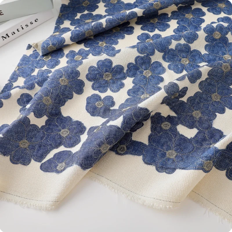 

Three-dimensional denim blue flower embroidery polyester fabric for outerwear, skirts, trousers and suits fabric