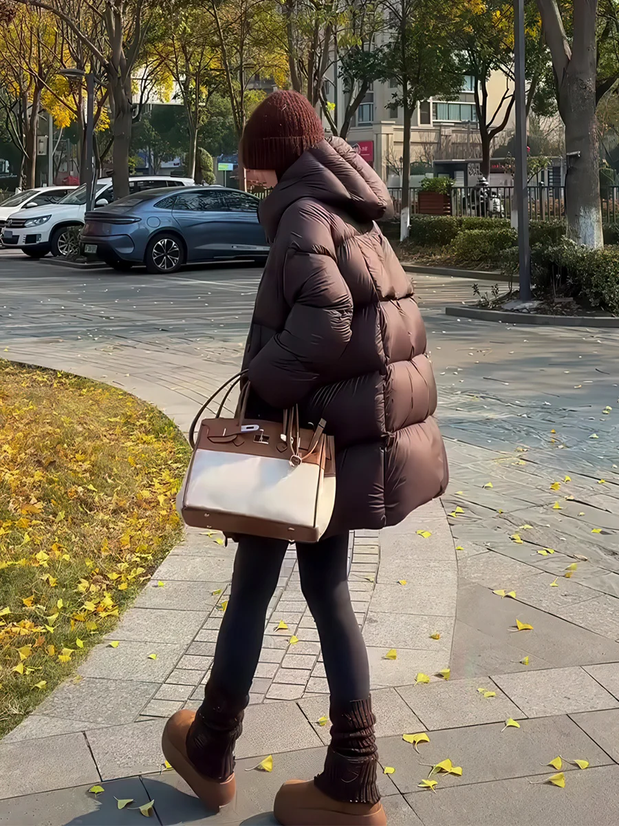 

Корейская женская удлиненная пуховая куртка 2026 года, новая зимняя модель с капюшоном на молнии, утепленная, свободного кроя, теплая, объемная, верхняя одежда