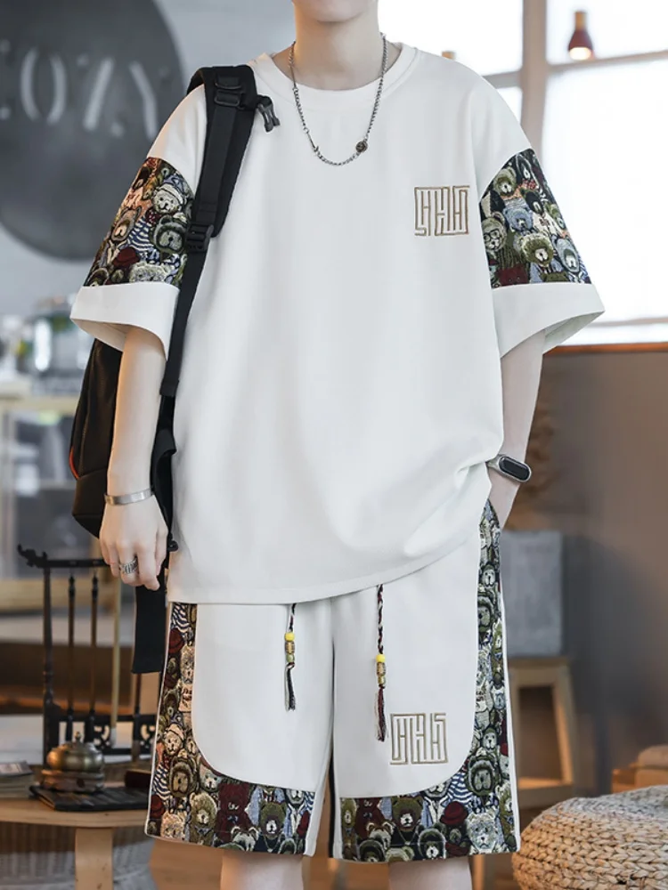 

Новый китайский мужской повседневный комплект из двух предметов: футболка с вышивкой медведя и шорты. Летний, дышащий, легкий, модный.