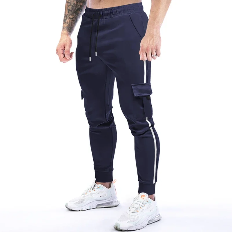 Pantaloni sportivi elastici da uomo pantaloni Casual pantaloni da Jogging traspiranti da uomo pantaloni sportivi da corsa ad asciugatura rapida abbigliamento uomo Streetwear