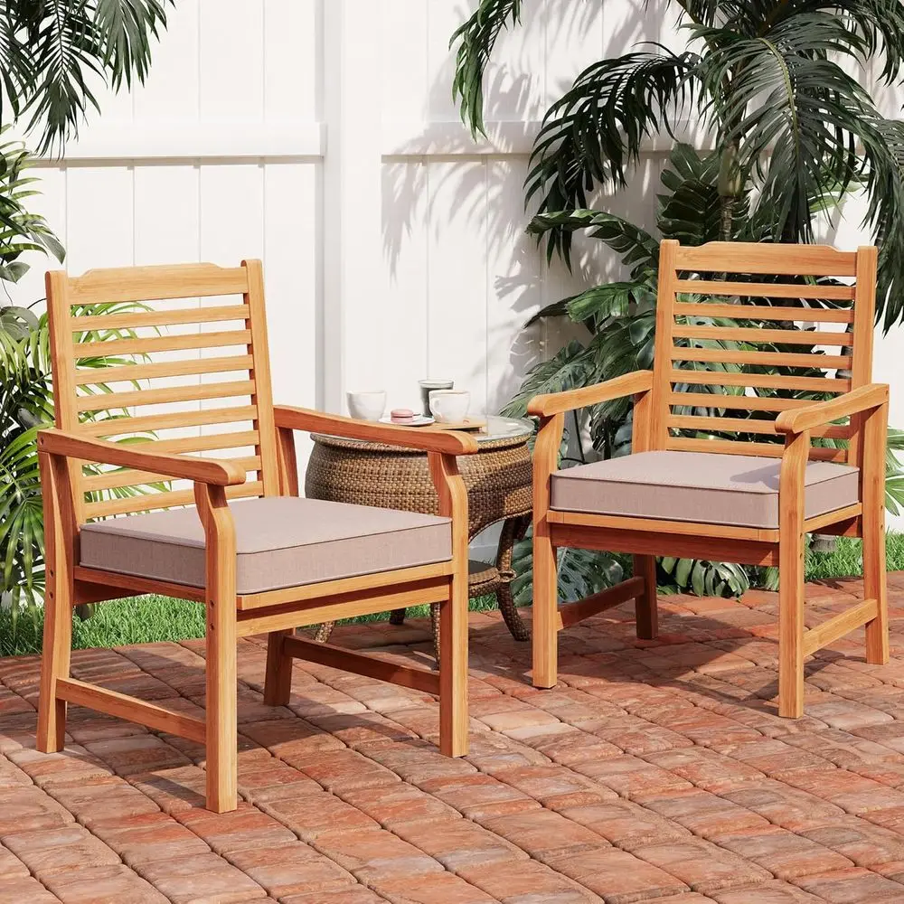 

2 Pieces Acacia Wood Outdoor Dining Chairs with Cushions, Patio Oil inished Wooden Armchairs Set o 2, Natural Teak Dining Chairs