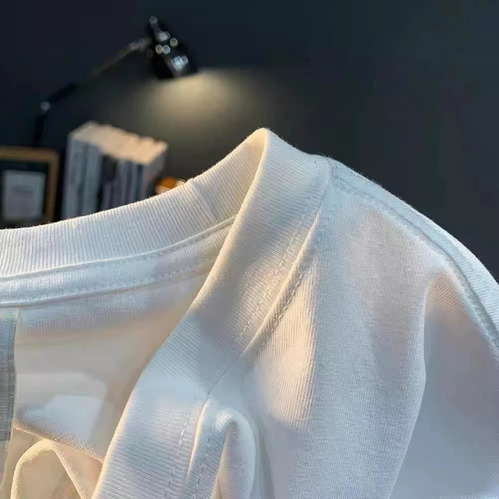 T-shirt da uomo e da donna in puro cotone stampato alla moda per l'estate, l'autunno e l'inverno con maniche corte, abbigliamento alla moda di strada