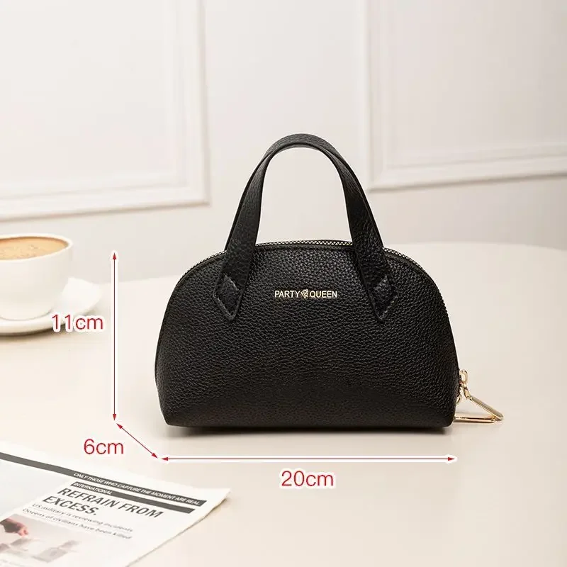 2025, neue schalenförmige tragbare Make-up-Tasche, schöne Handtasche aus schwarzem PU-Leder. Das Leder ist weich, klein und zart.